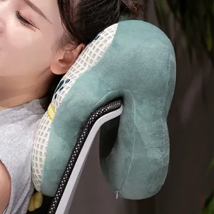 Detailed view of an ergonomic waffle ice silk nap pillow attached to a modern office chair