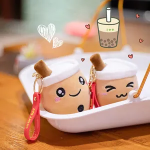 Adorable porte-clés en peluche bubble tea avec visage souriant et lanière rouge
