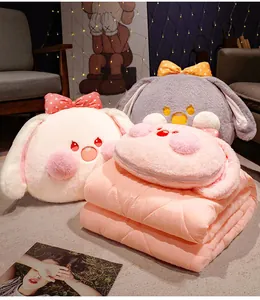 Niedliches 2-in-1 Hasen Plüschkissen und rosa gefaltete Kuscheldecke fürs Büro