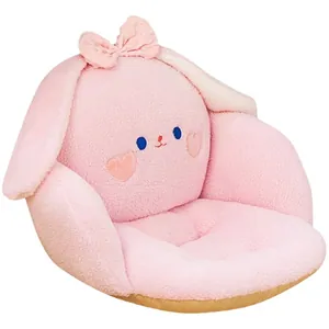 Lindo cojín de suelo de peluche de conejo rosa con lazo y textura suave de sherpa