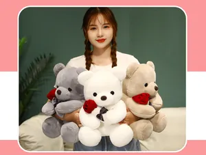Three soft plush teddy bears holding red roses and bowties for Valentine's Day gifts.