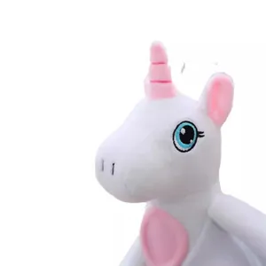 Peluche unicorno elettrico, simpatico animale bianco di peluche con corno rosa e occhi ricamati.