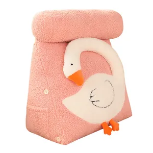 Pink triangular backrest pillow with a cute cartoon white goose plush for bed and sofa