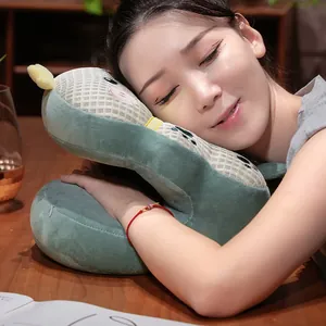 Close-up of a soft waffle pattern nap pillow used by a girl on a wooden desk.