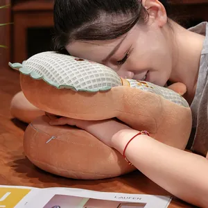 Asian model using a cartoon animal waffle ice silk nap pillow for desk sleeping detail