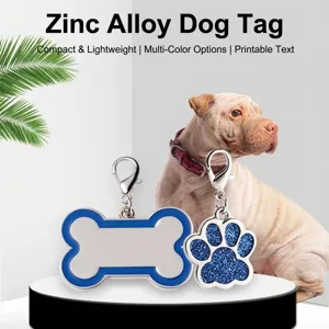 Close-up of zinc alloy pet pendants with blue bone and paw print glitter designs