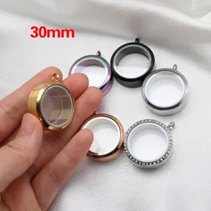 Close-up of 30mm stainless steel round glass locket pendants in various colors.