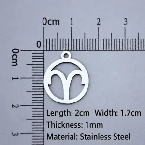 Close-up of stainless steel Aries zodiac charm with ruler showing 2cm length