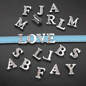 Macro detail showing 8mm silver rhinestone slide letters for DIY bracelet jewelry making