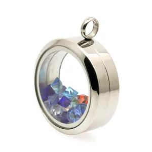 Close-up of a circular stainless steel glass locket pendant with colorful crystals.