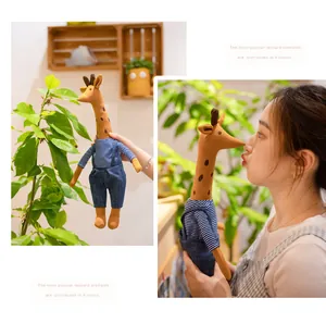 Asian model interacting with a cute giraffe plush toy wearing denim overalls and striped shirt