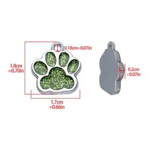 Green glittery dog paw pet ID tag with precise dimension markings