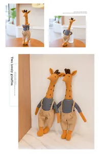 Adorable giraffe plush doll wearing striped shirt and linen overalls for nursery decor