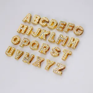 Detailed view of 8mm gold alloy letters encrusted with sparkling rhinestones for DIY jewelry