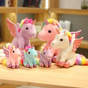 Peluche di unicorno angelo colorati con criniere arcobaleno e ali argentate in varie dimensioni