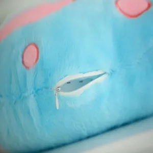 Détail de la fermeture éclair cachée sur l'oreiller peluche étoile lumineuse