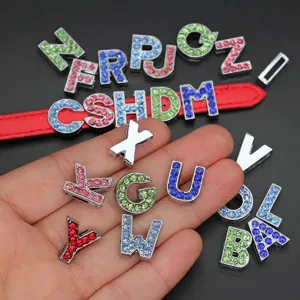 Macro detail of 10mm colorful rhinestone alphabet beads for DIY jewelry