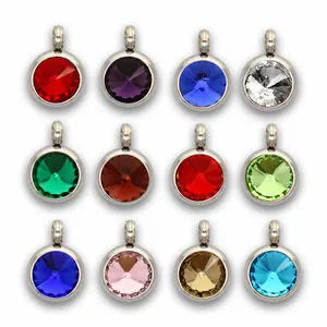 Detailed view of 12 multi-colored birthstone pendants with stainless steel settings