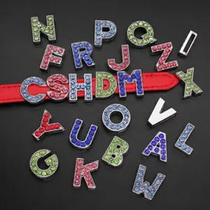 Detailed view of 10mm sparkling rhinestone alphabet slide charms in assorted colors