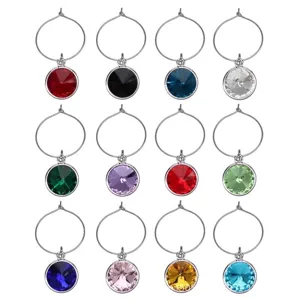 Detailed view of 12 different colored birthstone crystal charms for jewelry making.