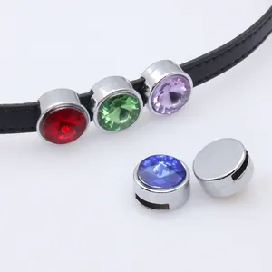 Macro detail of 8mm faceted crystal birthstone slider beads for DIY leather bracelets