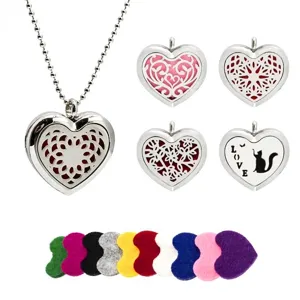 Detailed view of 30mm stainless steel heart aromatherapy locket with 10 colored felt pads