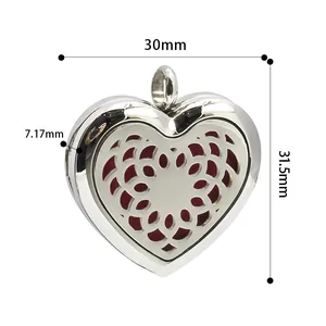 Detailed view of 30mm stainless steel heart hollow aromatherapy essential oil locket