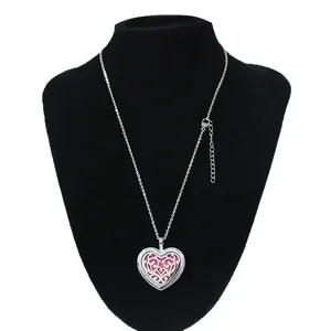 30mm heart-shaped stainless steel aromatherapy locket necklace with hollow pattern design