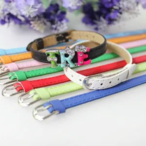 Detail of colorful 8mm PU leather DIY wristbands with slide-on charms 'TRE'