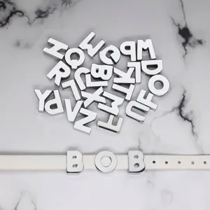 Close-up of 8mm chrome finish alphabet beads for personalized DIY jewelry creation