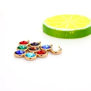 Close-up detail of 10mm colorful faceted birthstone pendants for DIY jewelry crafts