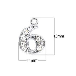 Close-up of silver rhinestone number 6 pendant with 15mm height and 11mm width dimensions