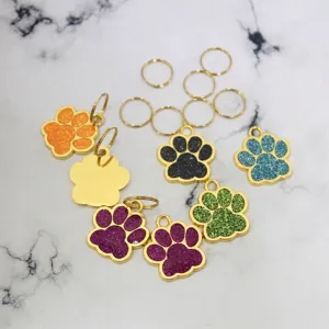 Médailles pour animaux en forma de patte avec paillettes et anneaux