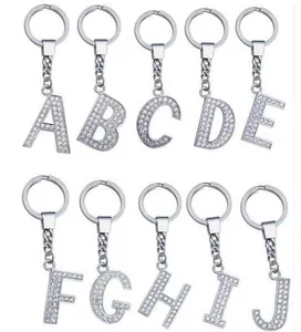 Detailed view of silver alloy alphabet keychains encrusted with shining rhinestones A to J