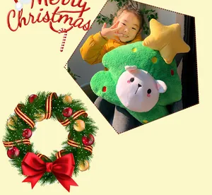 Christmas tree plush pillow with sheep face held by a child for decoration