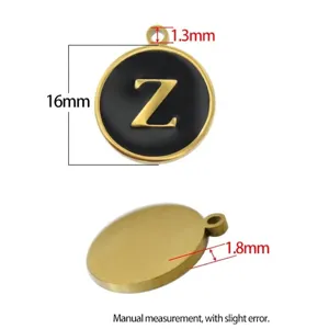 Detailed view of 16mm stainless steel round pendant with letter Z in gold and black enamel