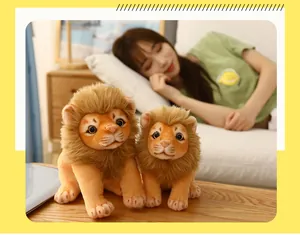 Two adorable lion plush toys placed on a wooden table in a warm lifestyle scene