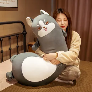 Adorable curved husky long body pillow for side sleepers shown in a cozy bedroom setting