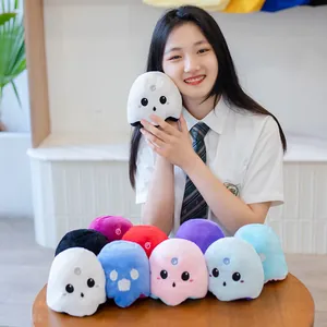 Detail shot of cute reversible ghost plush toys in various vibrant colors for Halloween