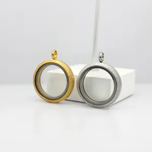 Macro shot of gold and silver circular frosted stainless steel glass locket pendants