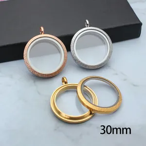 Detail view of 30mm stainless steel frosted glass locket pendants in various colors