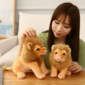 Cute lion plush toy set forest animal doll displayed with Asian model in home setting