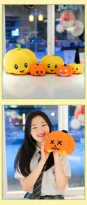 Dettaglio di un simpatico peluche a zucca reversibile tenuto da una ragazza per Halloween