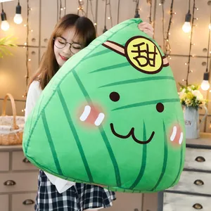 Cute green zongzi plush pillow toy with cartoon face for Dragon Boat Festival gift