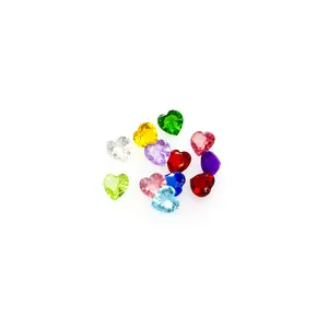 Close-up of colorful heart-shaped crystal glass birthstones for DIY jewelry making
