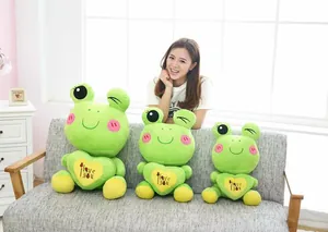 Three different sizes of cute green cartoon frog plush toys featuring an I love you heart