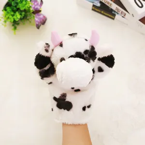 Detailed macro view of a cute plush cow hand puppet perfect for educational storytelling