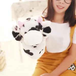 Detailed view of plush cow hand puppet for kids storytelling and creative role play