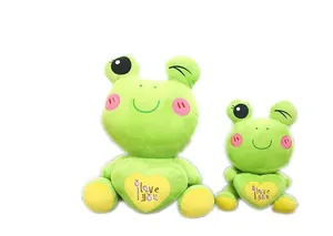 Two cute green frog plush toys with 'I love you' heart embroidery on white background