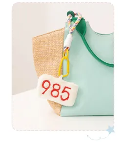 Creative 985 embroidered plush keychain charm for school bags, a lucky graduation gift idea